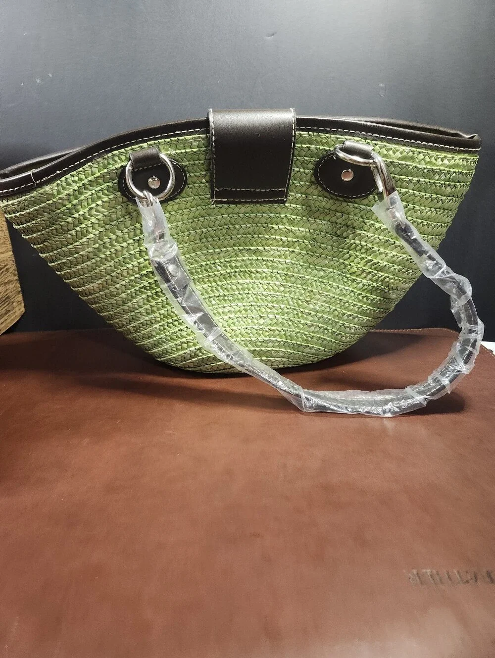 vintage St. John's Bay woven straw shoulder bag.